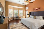 Luxury Style Master Suite with King bed & private workspace that looks out to the backyard